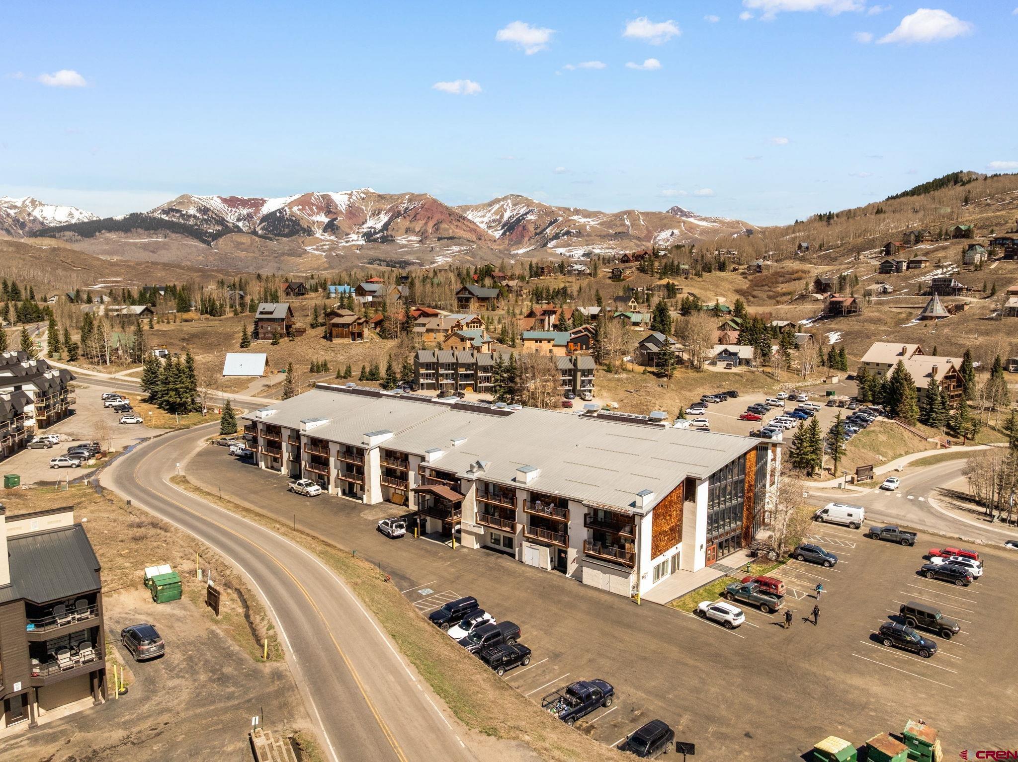 701 Gothic Road, Unit 143 Crested Butte, CO 81225 - Photo 6 of 30 an aerial view of residential houses with city view and mountains