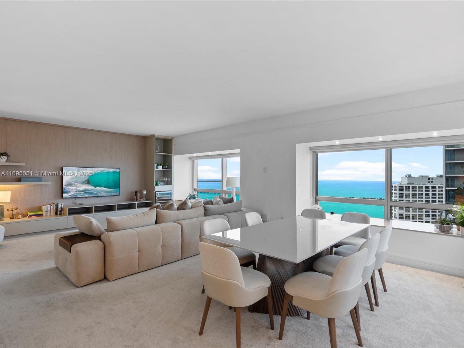 a living room with fireplace furniture and a flat screen tv