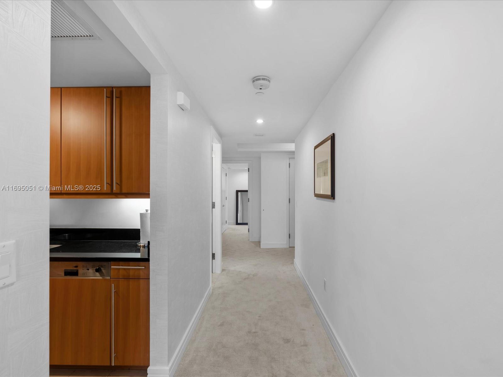1435 Brickell Avenue, Unit 3601 Miami, FL 33131 - Photo 13 of 42 a view of hallway with stairs