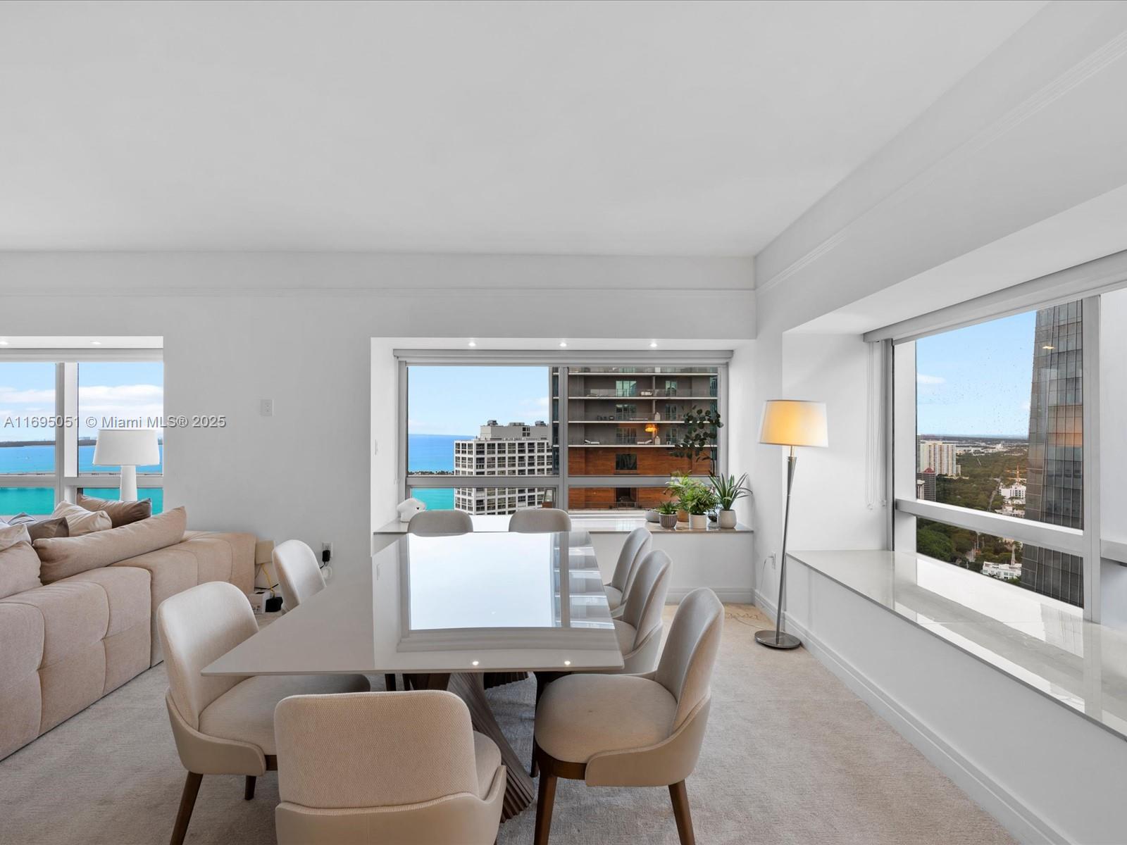 1435 Brickell Avenue, Unit 3601 Miami, FL 33131 - Photo 7 of 42 a dining room with furniture and window