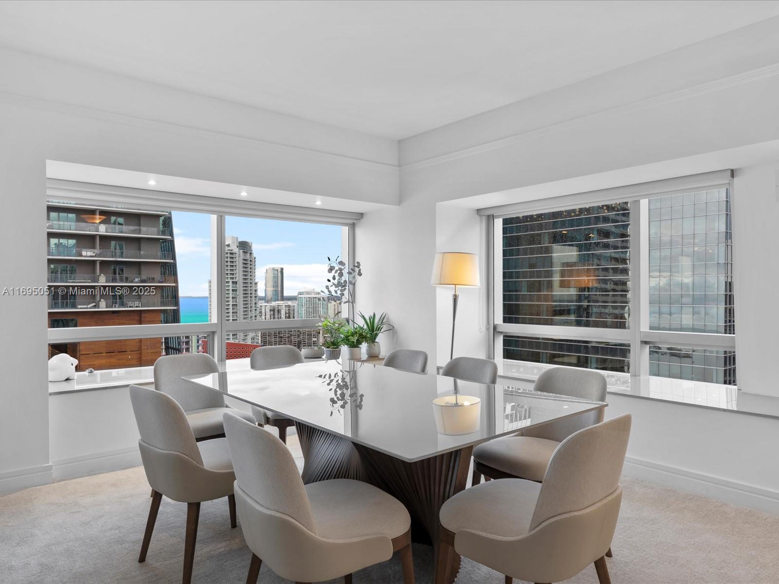 1435 Brickell Avenue, Unit 3601 Miami, FL 33131 - Photo 8 of 42 a dining room with furniture and window