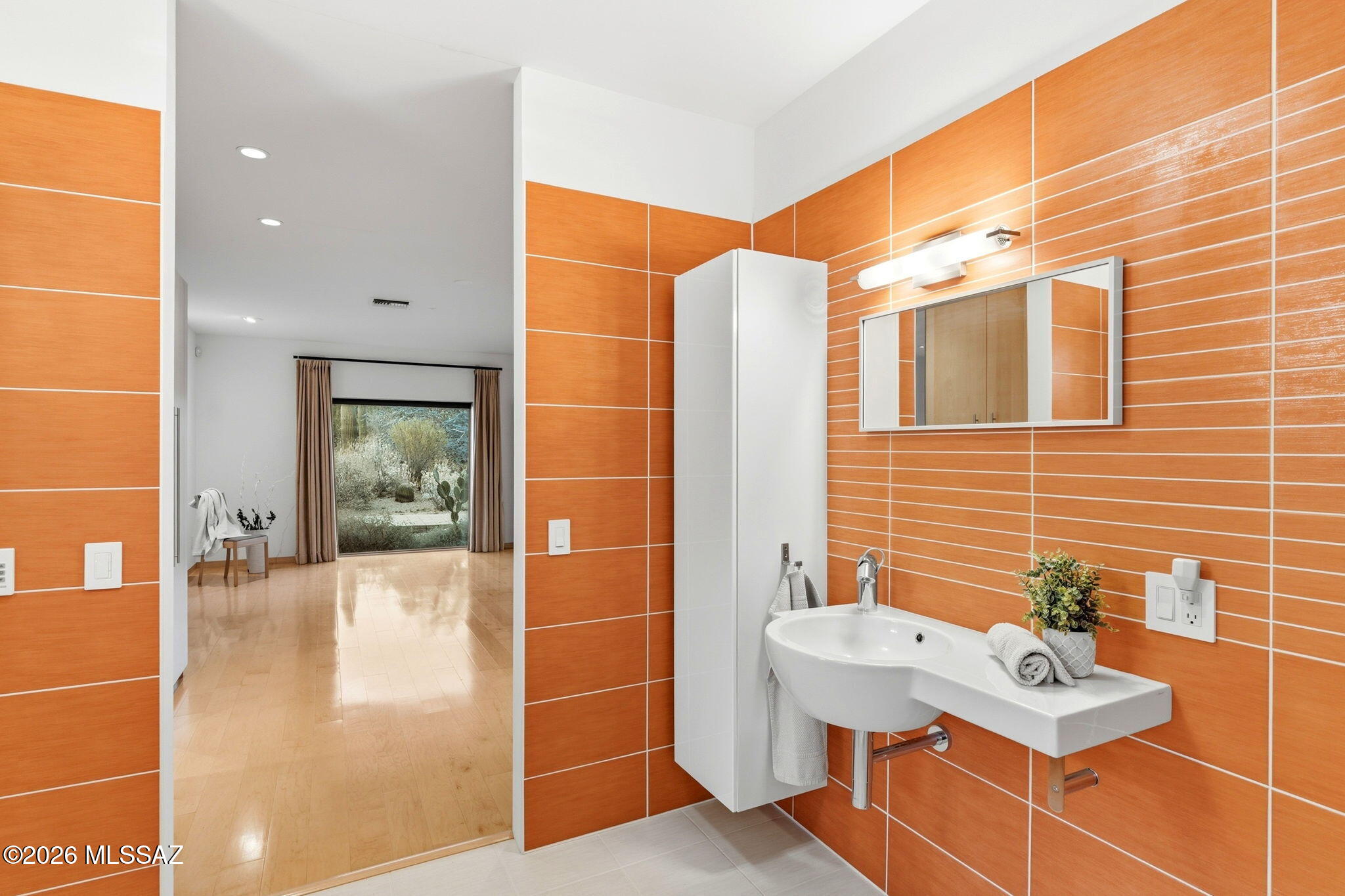 5070 North Valley View Road Tucson, AZ 85718 - Photo 38 of 51 a bathroom with a sink toilet and shower