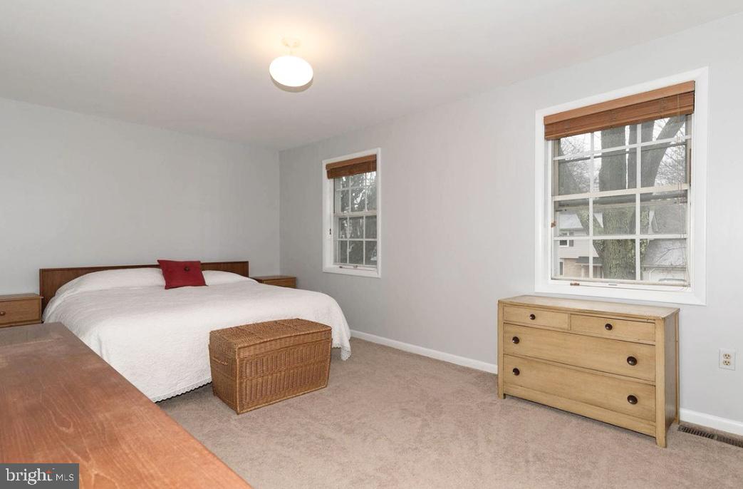 403 Merryman Road Annapolis, MD 21401 - Photo 11 of 31 a bedroom with a bed and a window