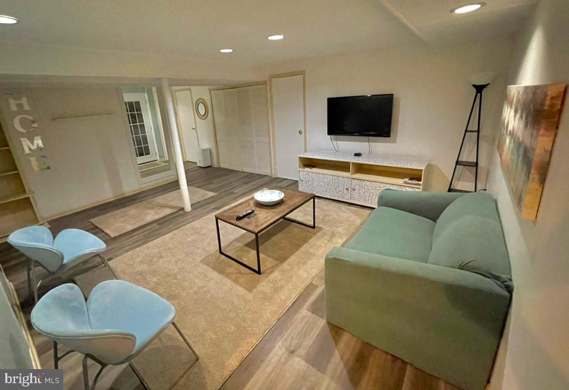 403 Merryman Road Annapolis, MD 21401 - Photo 18 of 31 a living room with furniture and a flat screen tv