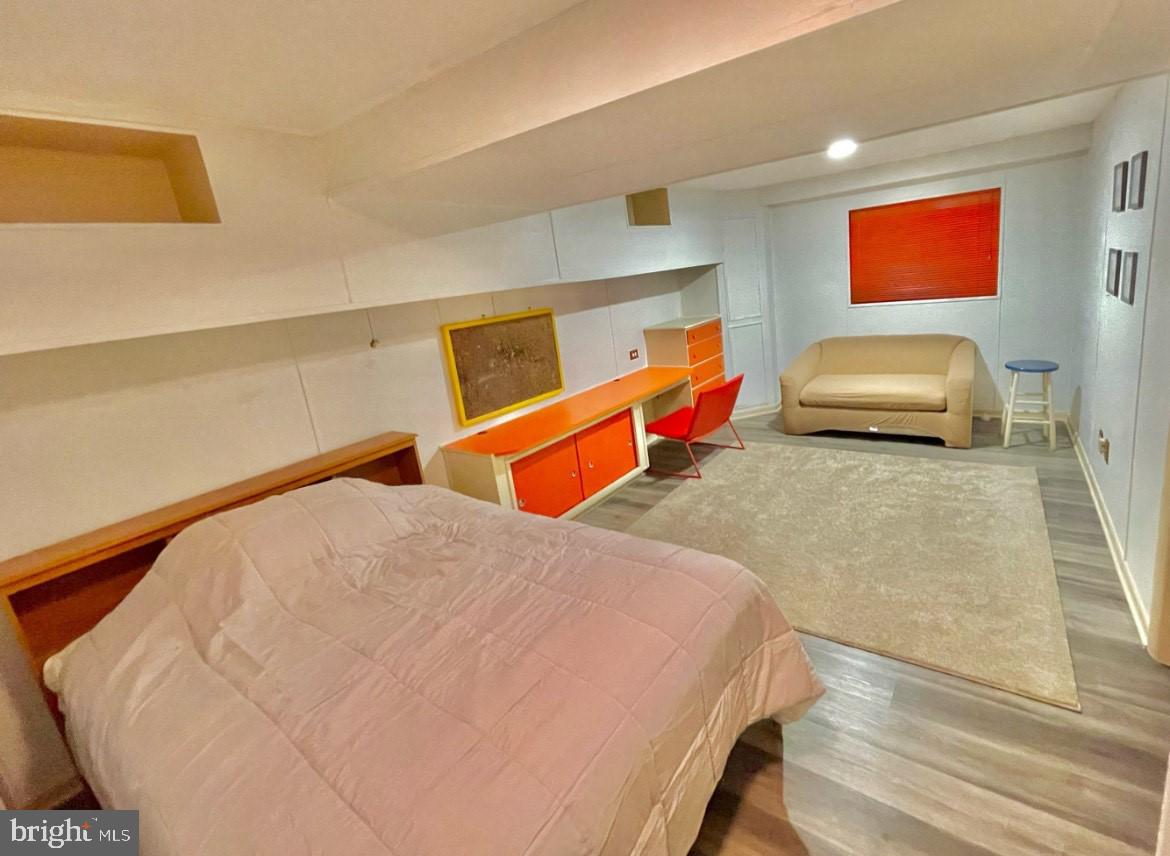 403 Merryman Road Annapolis, MD 21401 - Photo 21 of 31 a bedroom with a bed and dresser