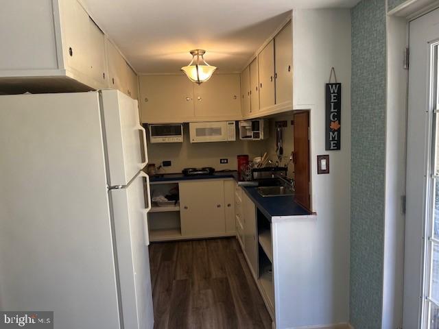 403 Merryman Road Annapolis, MD 21401 - Photo 22 of 31 a kitchen with stainless steel appliances a refrigerator sink and cabinets