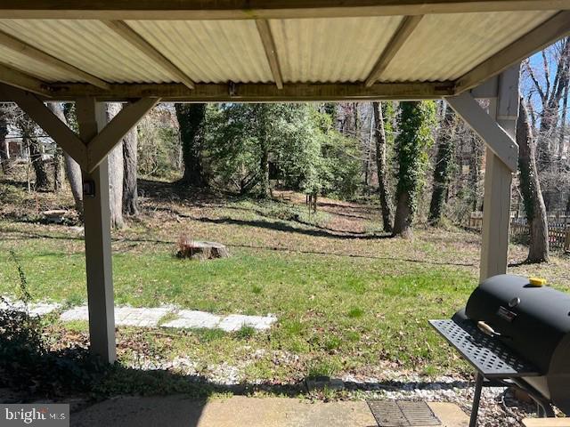 403 Merryman Road Annapolis, MD 21401 - Photo 27 of 31 a view of a couches under an umbrella