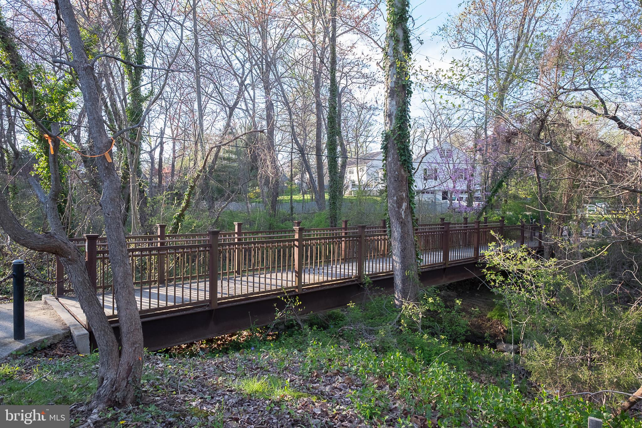 403 Merryman Road Annapolis, MD 21401 - Photo 30 of 31 a view of a wooden deck with a trees