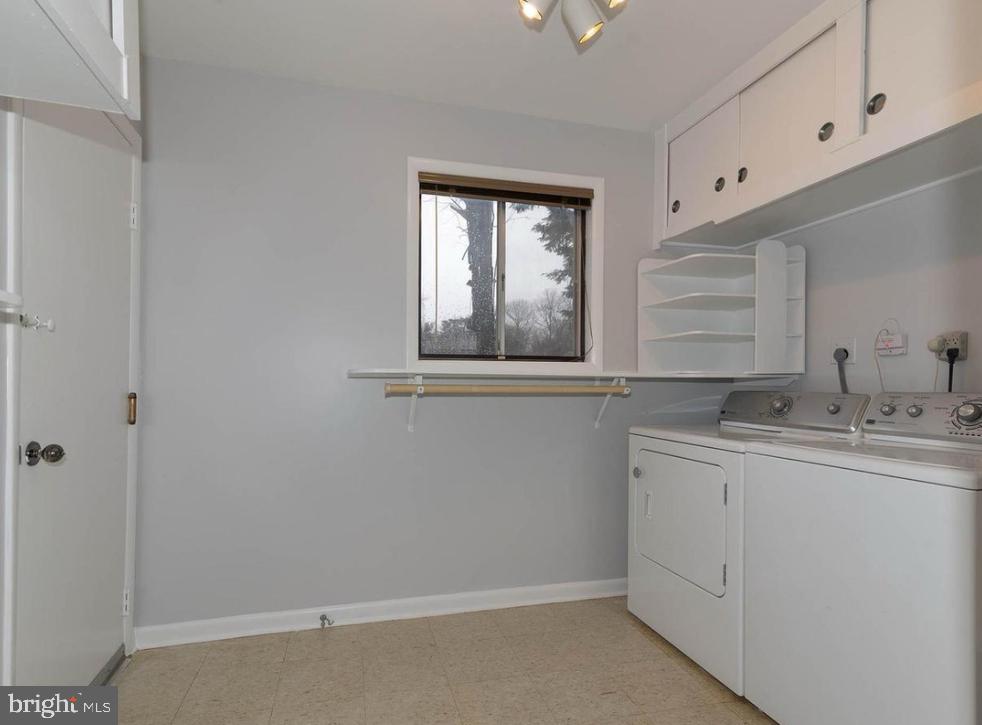 403 Merryman Road Annapolis, MD 21401 - Photo 10 of 31 a bathroom with a sink and a mirror