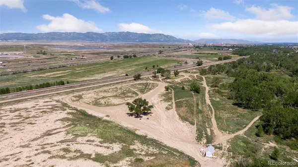 a view of an ocean and a mountain