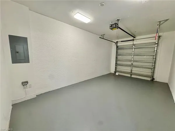 a view of swimming pool with chairs