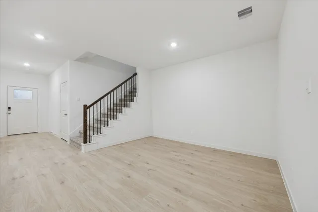 a view of entryway with wooden floor
