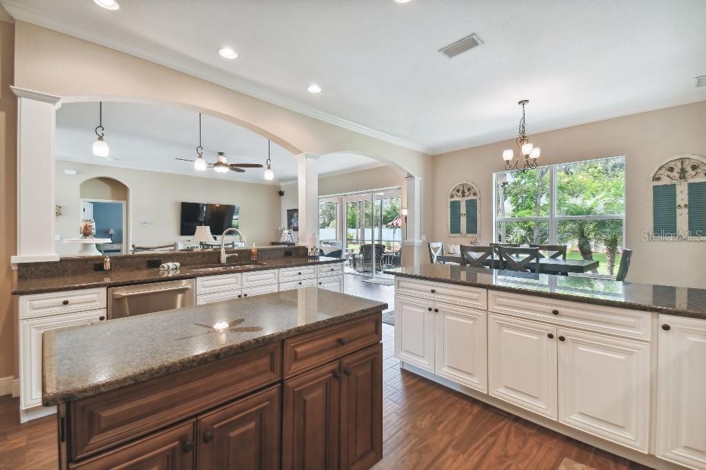 849 John Cressler Drive Seffner, FL 33584 - Photo 12 of 45 a kitchen with kitchen island granite countertop lots of counter top space