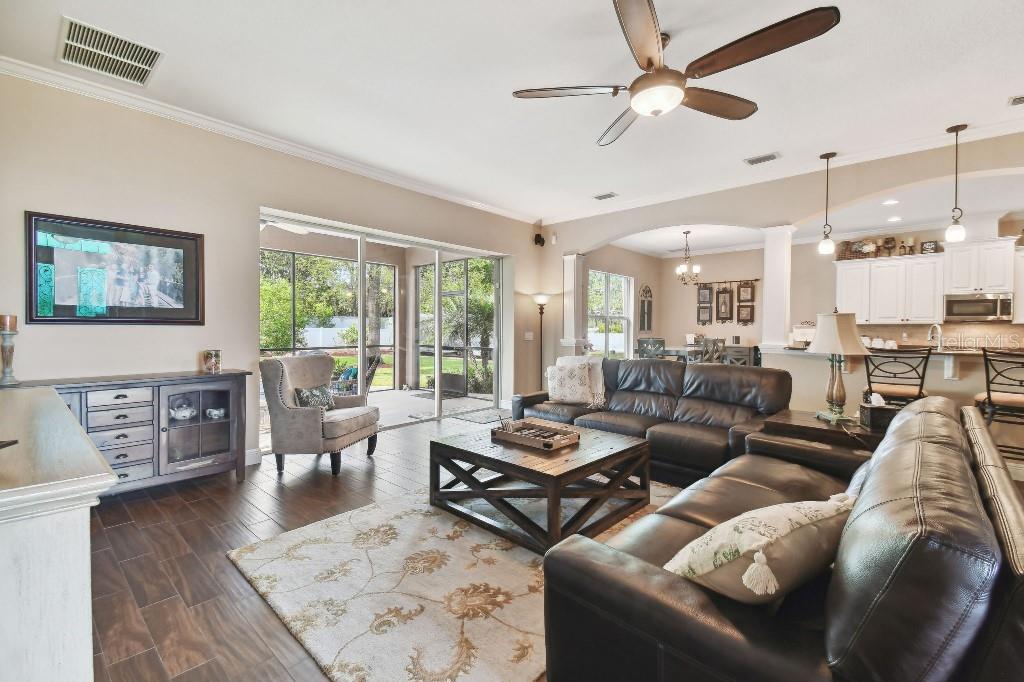 849 John Cressler Drive Seffner, FL 33584 - Photo 17 of 45 a living room with furniture and a large window