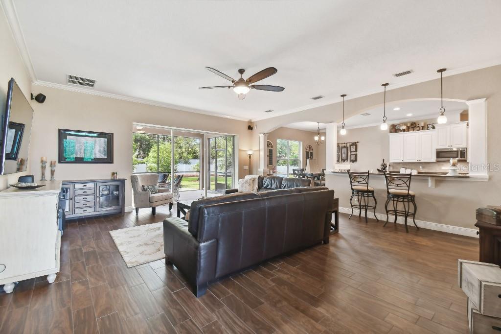 849 John Cressler Drive Seffner, FL 33584 - Photo 18 of 45 a living room with furniture and a large window