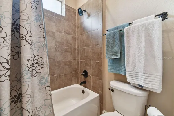 a bathroom with a sink and toilet