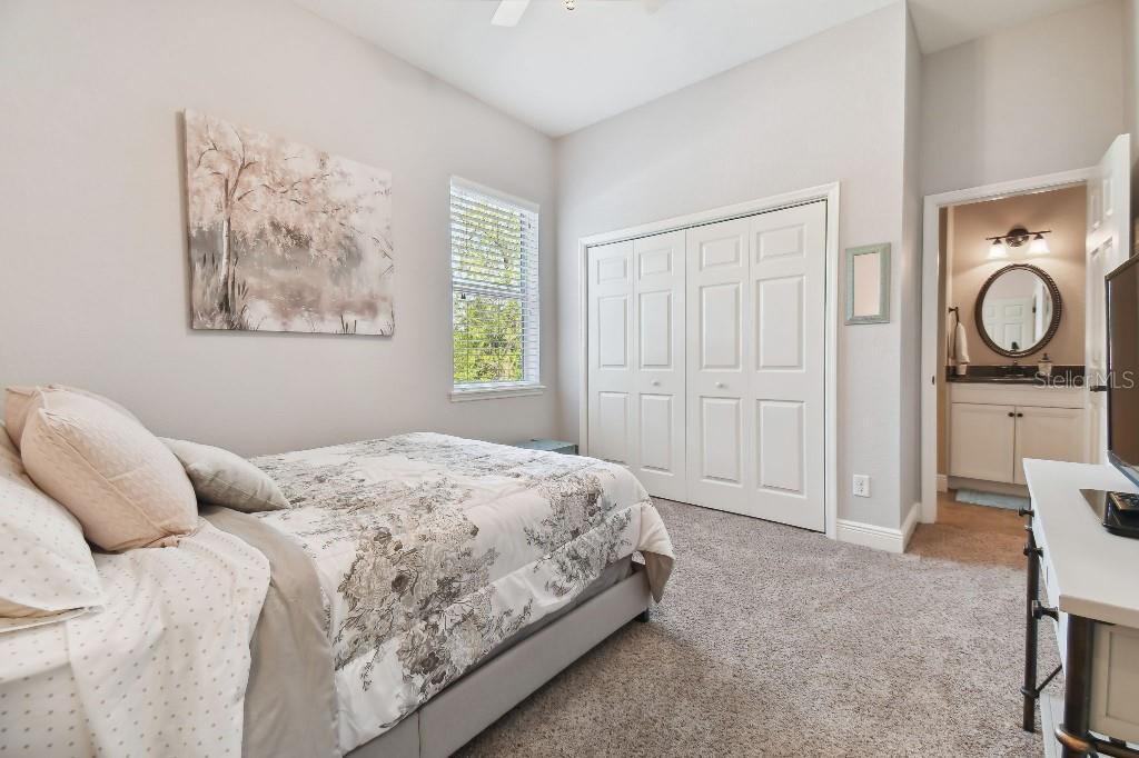 849 John Cressler Drive Seffner, FL 33584 - Photo 28 of 45 a bedroom with a bed and a window