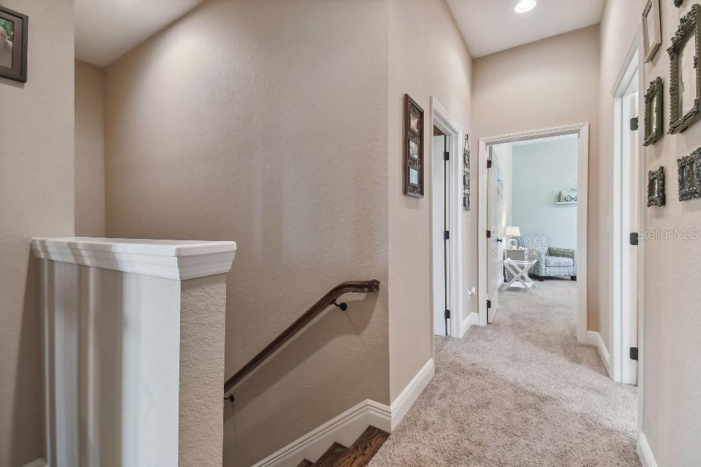 849 John Cressler Drive Seffner, FL 33584 - Photo 30 of 45 a view of a hallway with closet and a livingroom view