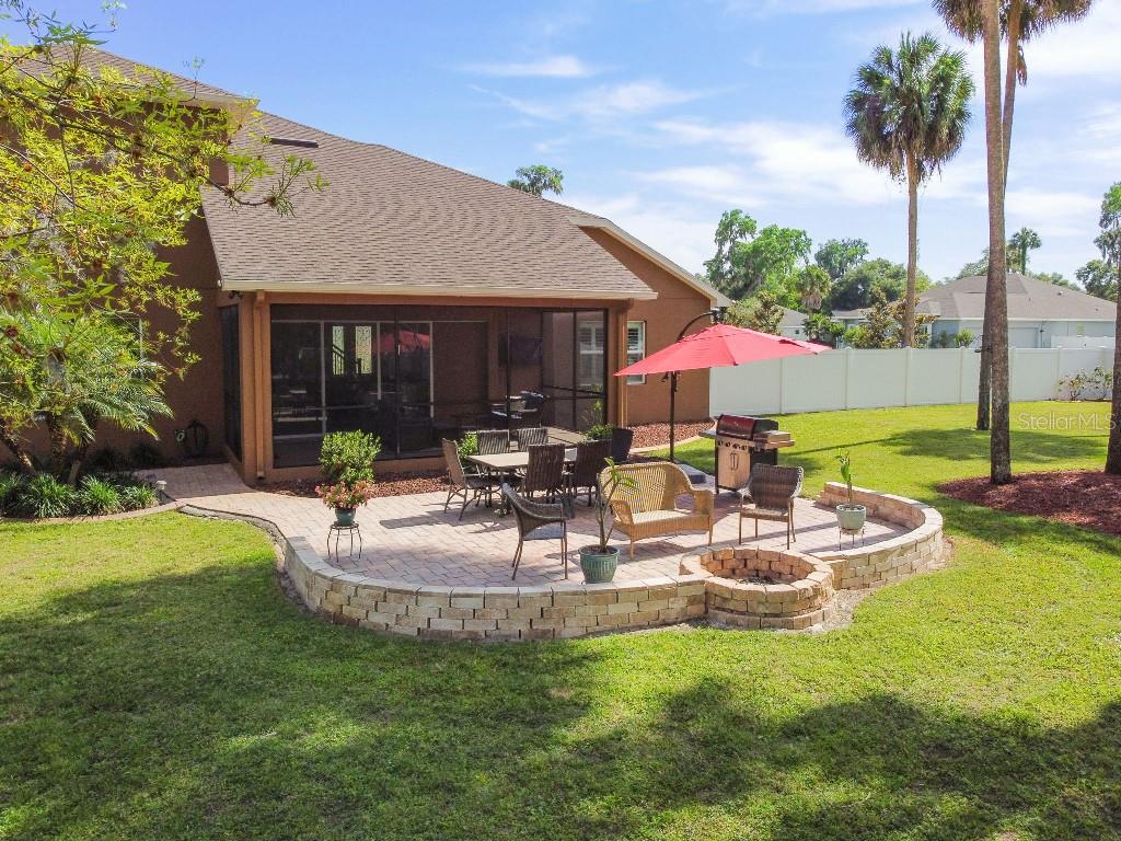 849 John Cressler Drive Seffner, FL 33584 - Photo 39 of 45 a view of a house with garden and sitting area