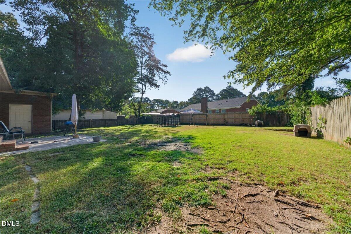 2611 Nottingham Road Northwest Wilson, NC 27896 - Photo 19 of 21 Rear Exterior with Landscape