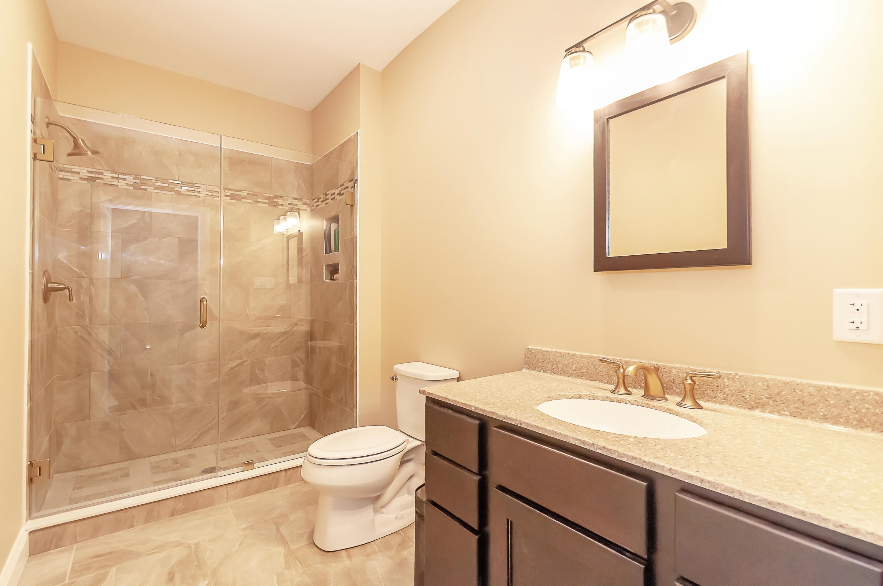 21 Sheppard Road Sagamore Beach, MA 02562 - Photo 13 of 33 a bathroom with a granite countertop sink toilet and shower