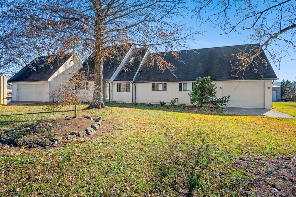 2040 Maples Branch Road Sevierville, TN 37876 - Photo 4 of 40 a view of a house with a yard