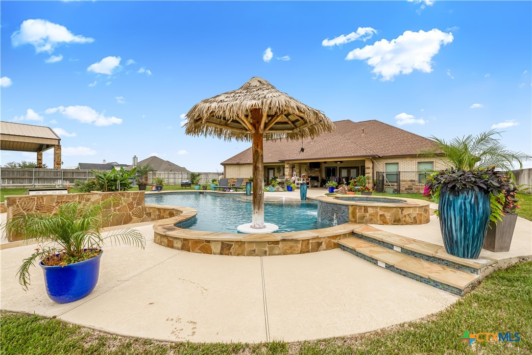 254 Sendera Loop Victoria, TX 77904 - Photo 9 of 48 a view of a house with backyard water house and sitting area