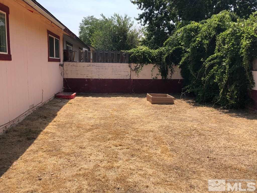 6541 Flower Street Reno, NV 89506 - Photo 13 of 14 a view of a backyard of the house