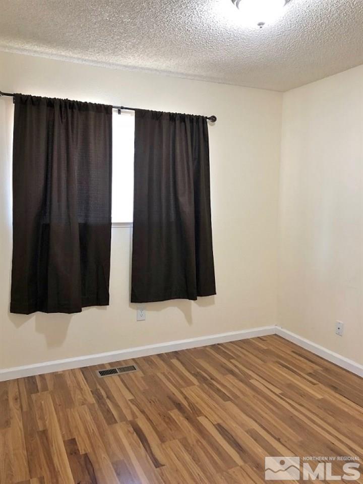 6541 Flower Street Reno, NV 89506 - Photo 10 of 14 a view of wooden floor