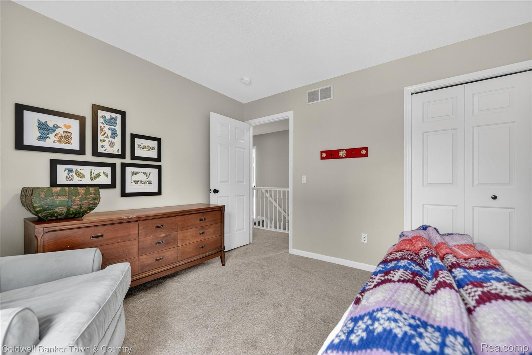 918 Gray Fox Court Howell, MI 48843 - Photo 38 of 84 Neutral-toned walls complement plush carpet flooring