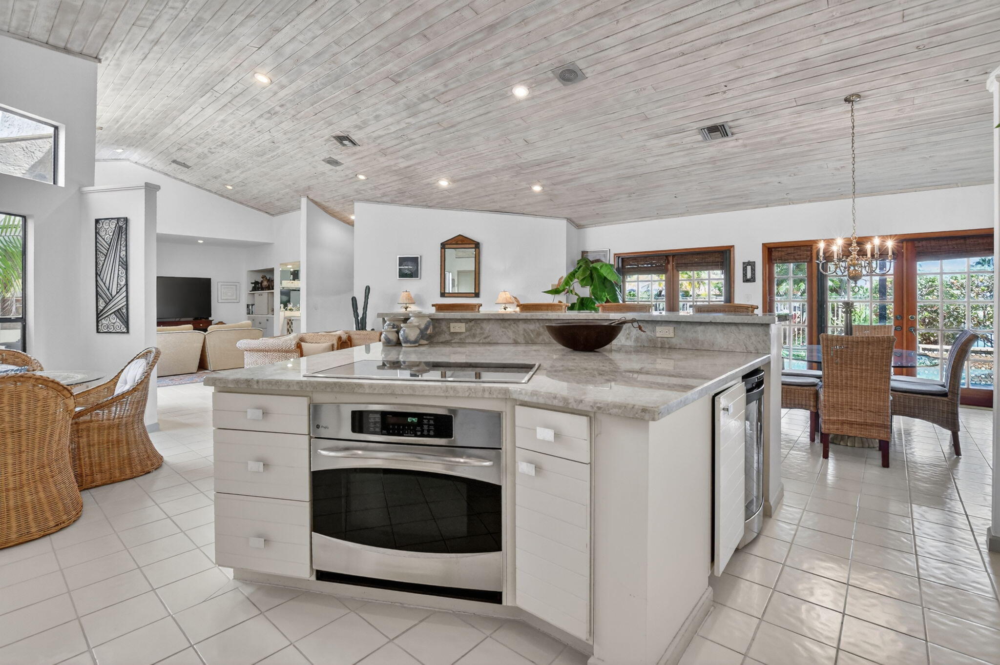 22519 Esplanada Circle, Unit W Boca Raton, FL 33433 - Photo 25 of 57 a kitchen with stainless steel appliances granite countertop a stove and more cabinets