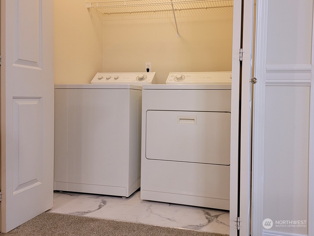 440 Maple Avenue Southwest, Unit A203 Renton, WA 98057 - Photo 13 of 33 a utility room with dryer and washer