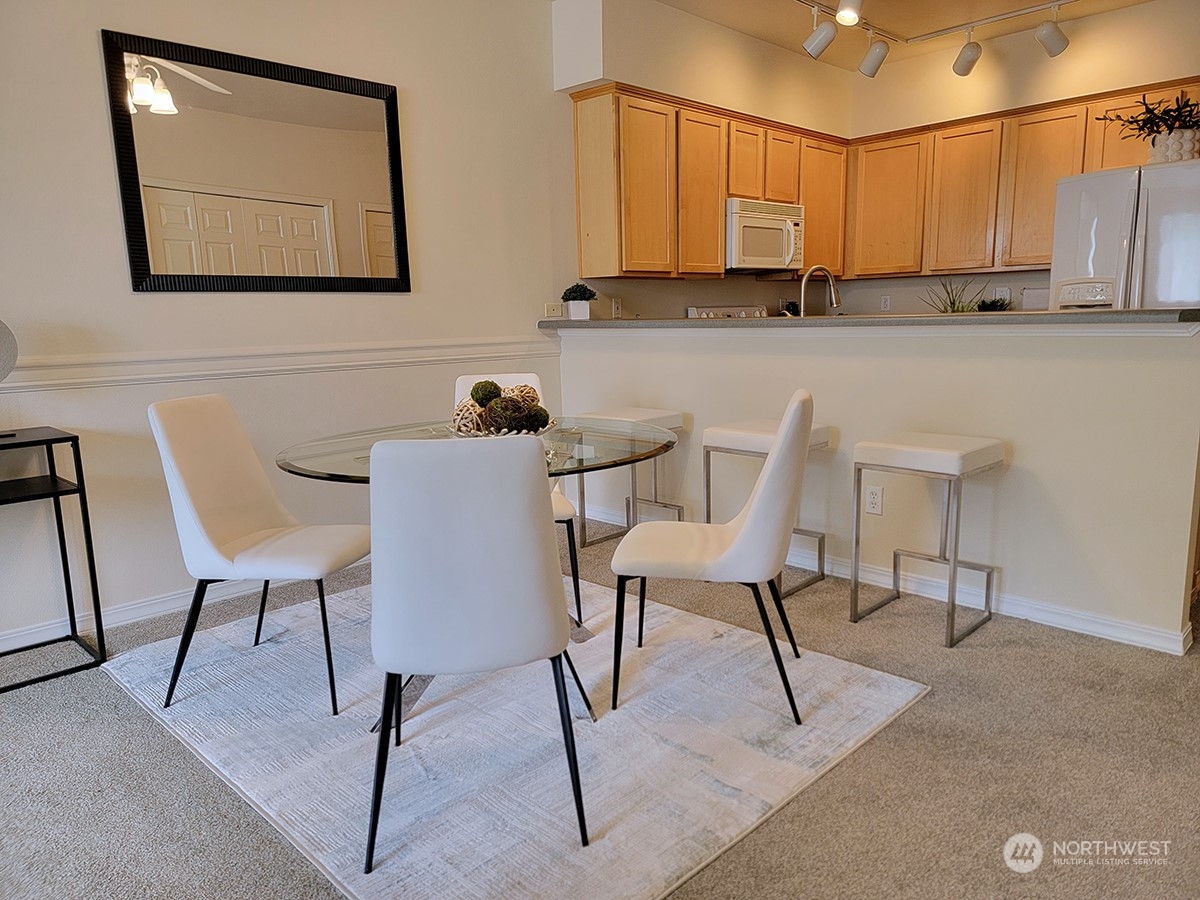 440 Maple Avenue Southwest, Unit A203 Renton, WA 98057 - Photo 15 of 33 a view of kitchen with furniture and window