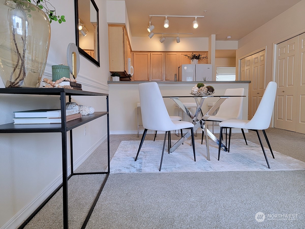 440 Maple Avenue Southwest, Unit A203 Renton, WA 98057 - Photo 17 of 33 a view of a dining room with furniture