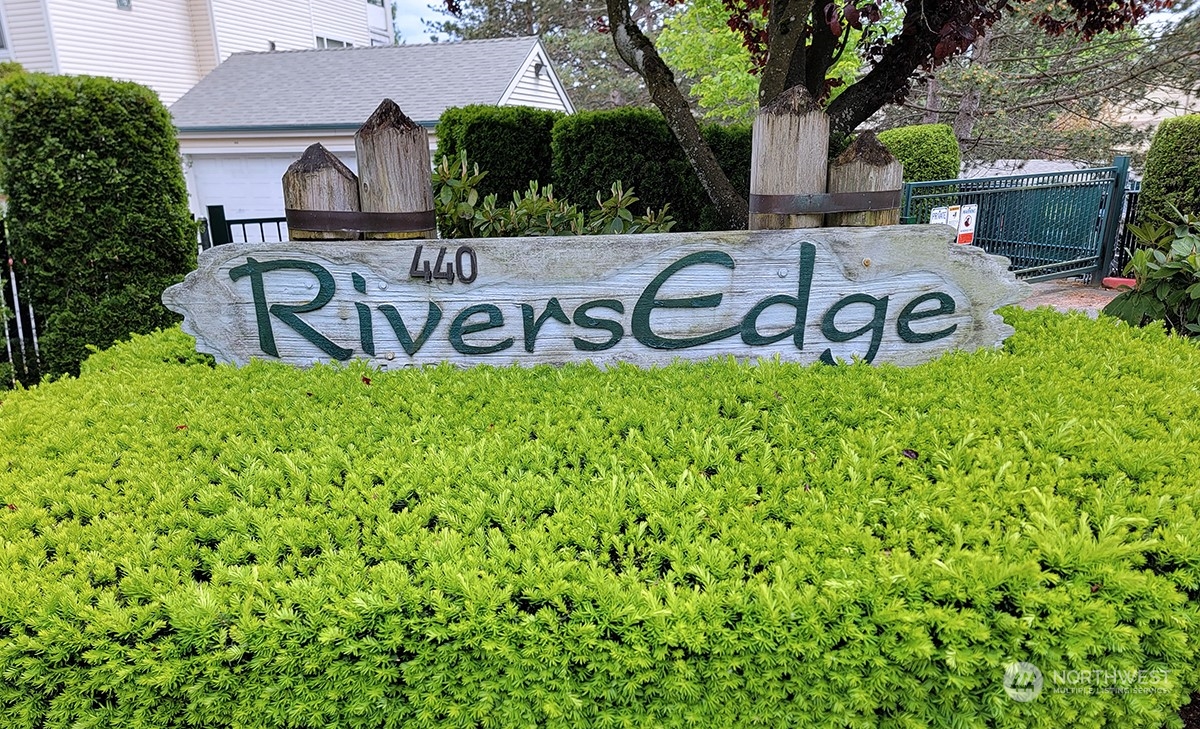 440 Maple Avenue Southwest, Unit A203 Renton, WA 98057 - Photo 2 of 33 a view of a bunch of plants and bench