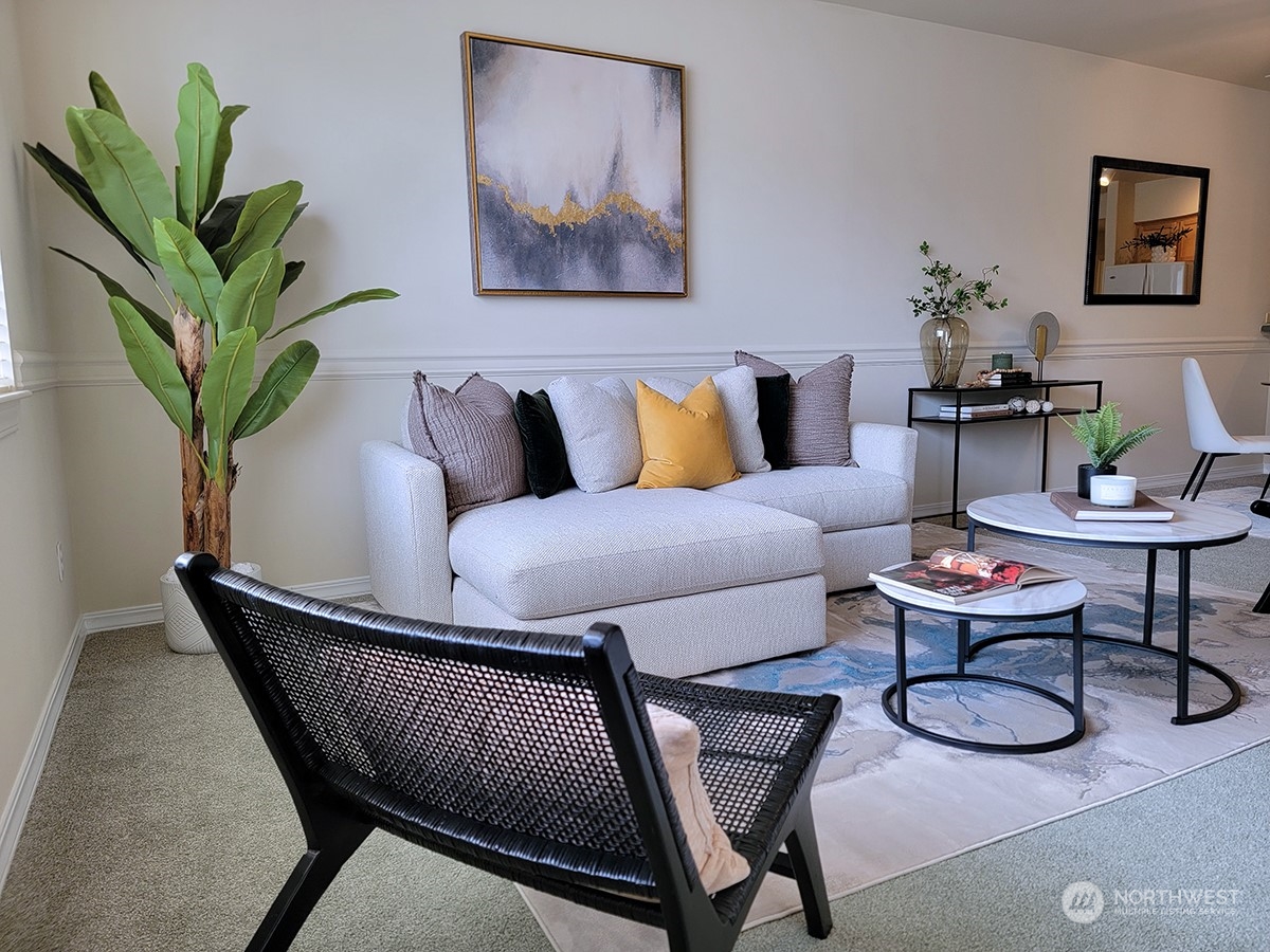 440 Maple Avenue Southwest, Unit A203 Renton, WA 98057 - Photo 23 of 33 a living room with furniture flowerpot and a potted plant
