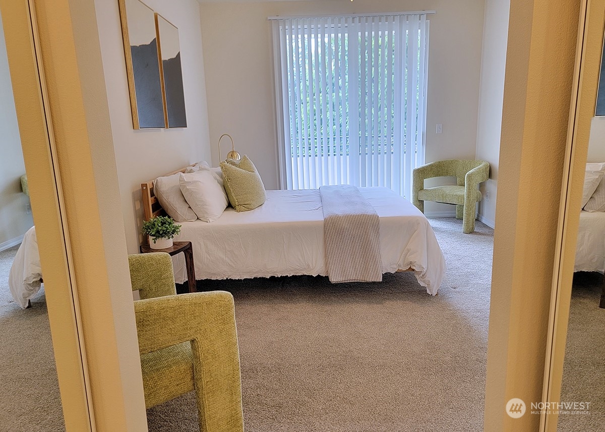 440 Maple Avenue Southwest, Unit A203 Renton, WA 98057 - Photo 30 of 33 a bedroom with a bed and a window