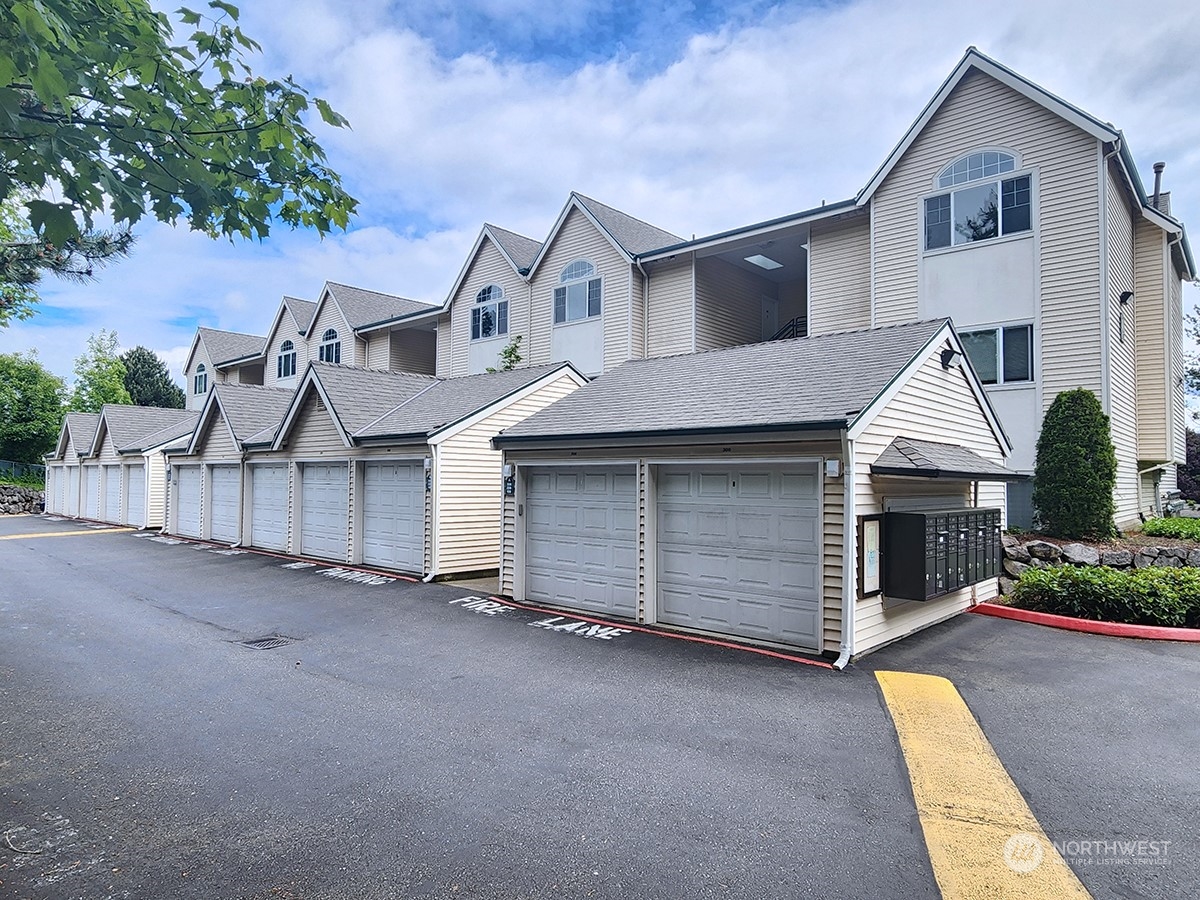 440 Maple Avenue Southwest, Unit A203 Renton, WA 98057 - Photo 31 of 33 front view of a house with a street