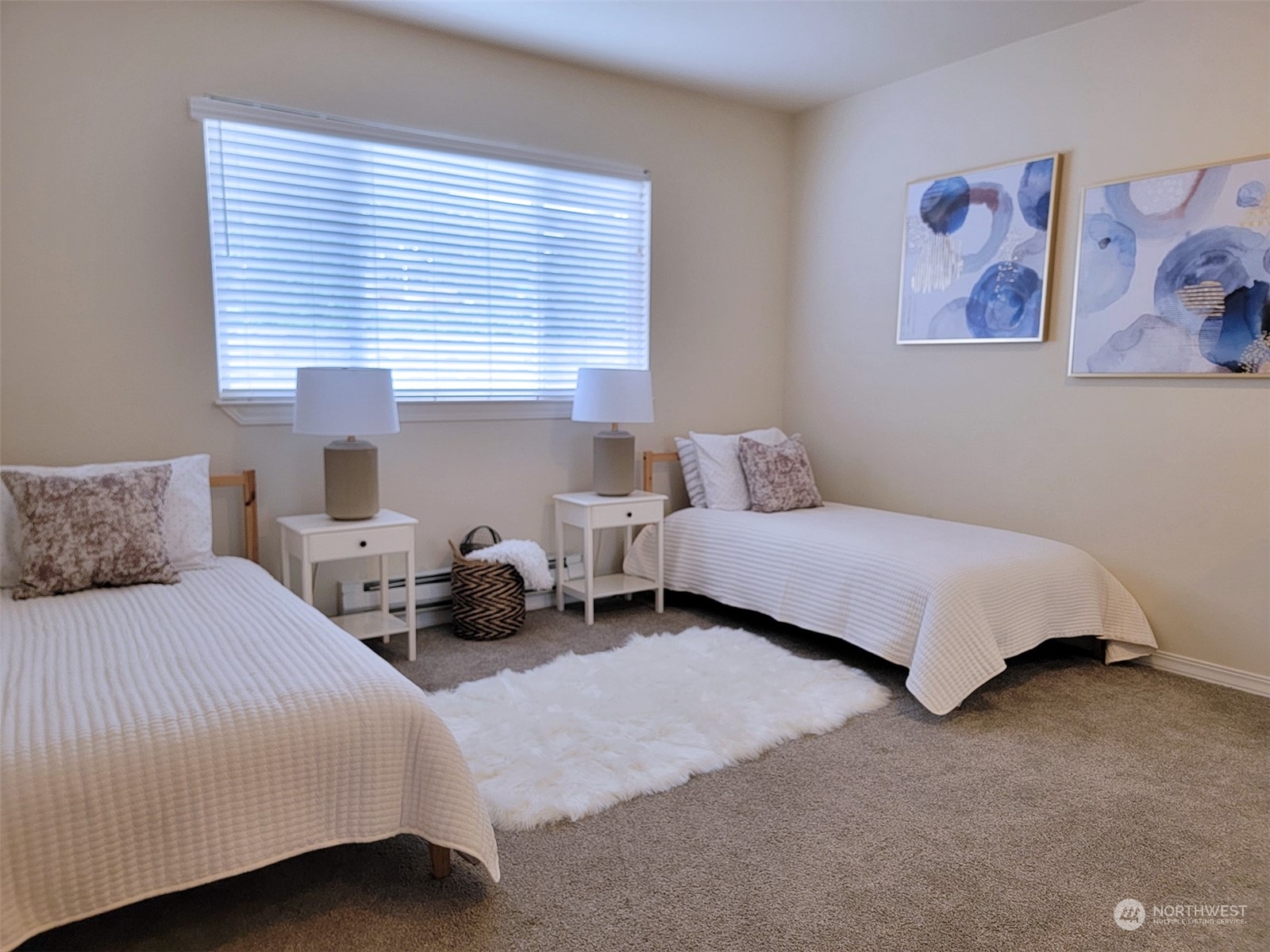 440 Maple Avenue Southwest, Unit A203 Renton, WA 98057 - Photo 7 of 33 a bedroom with a bed a couch and a window