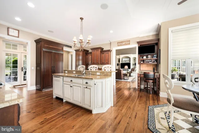 a bathroom with a tub sink and a window