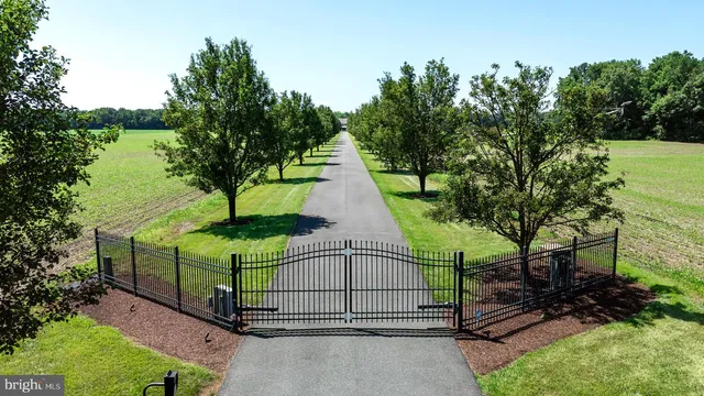 a view of a golf course with a building in the background