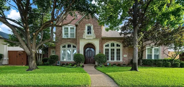 a view of a living room a flat screen tv and a fireplace