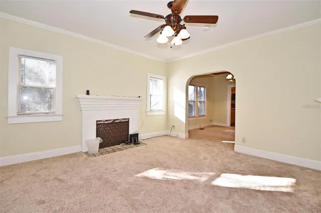 an empty room with windows