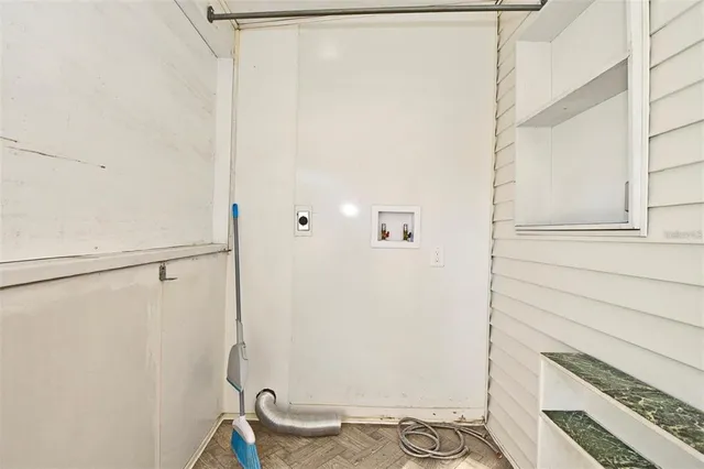 a kitchen with stainless steel appliances granite countertop a sink and a cabinets