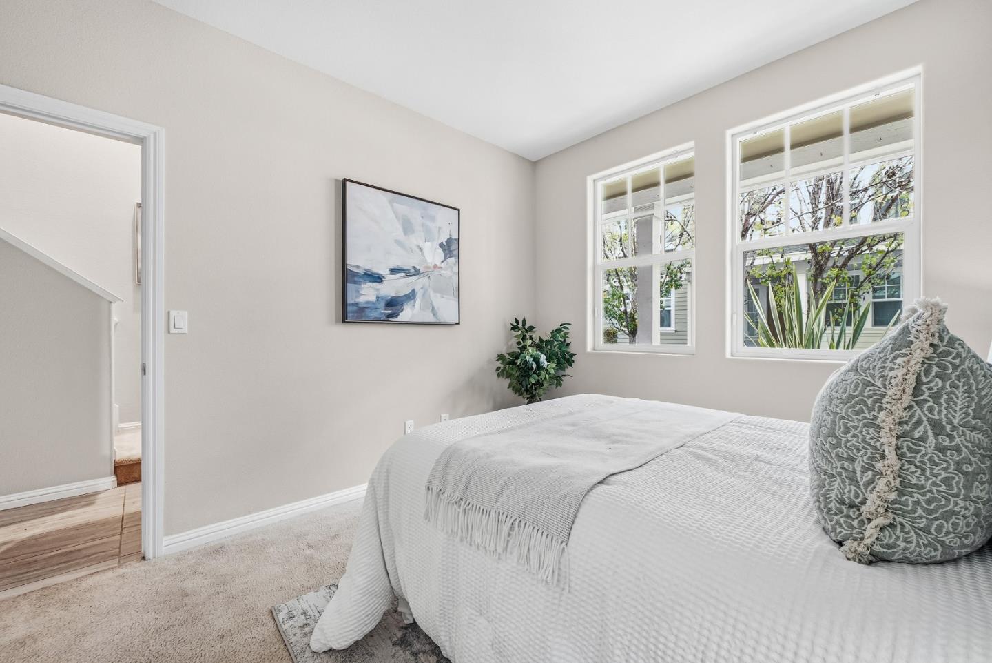346 Circuit Way Mountain View, CA 94043 - Photo 18 of 65 a bedroom with a large bed and a window