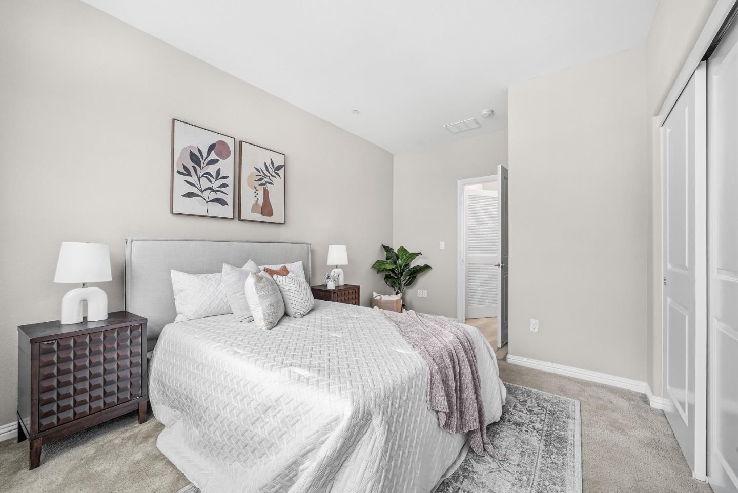 346 Circuit Way Mountain View, CA 94043 - Photo 22 of 65 a bedroom with a bed and a lamp with the wooden floor