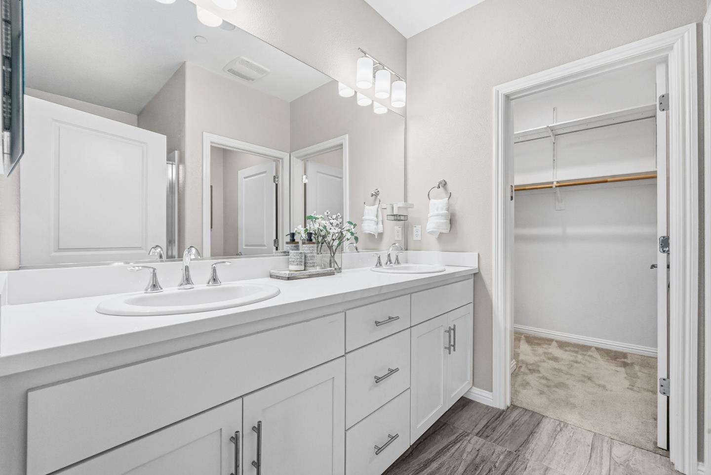 346 Circuit Way Mountain View, CA 94043 - Photo 27 of 65 a bathroom with a double vanity sink and a mirror