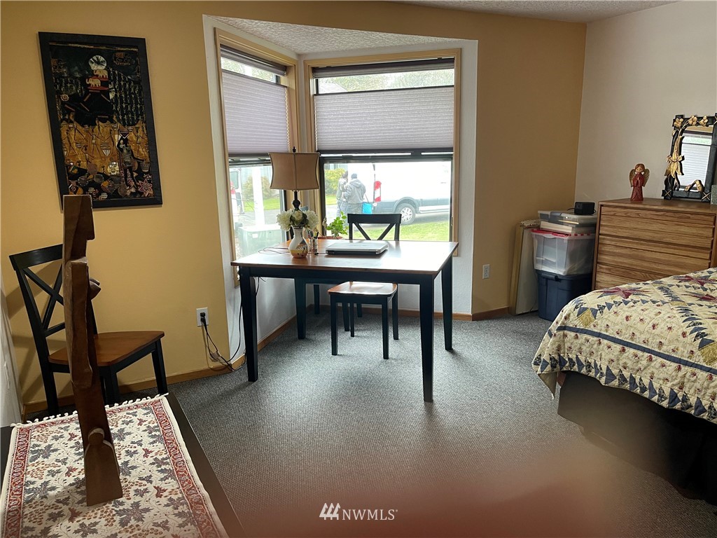 3300 Northeast 164th Street, Unit H2 Ridgefield, WA 98642 - Photo 15 of 24 a living room with furniture and a window