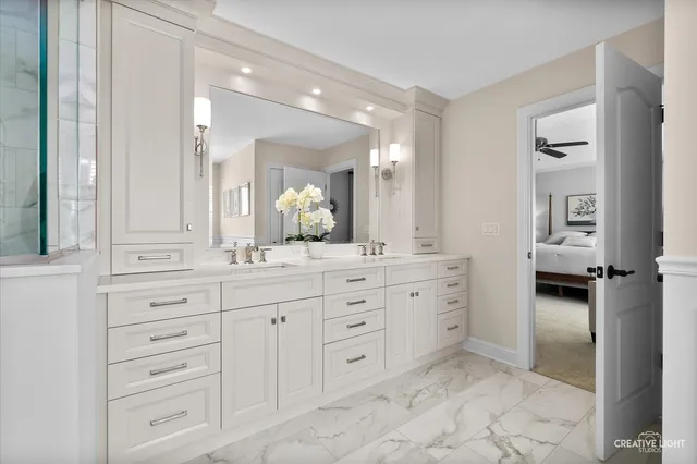 a bathroom with a bathtub and a sink