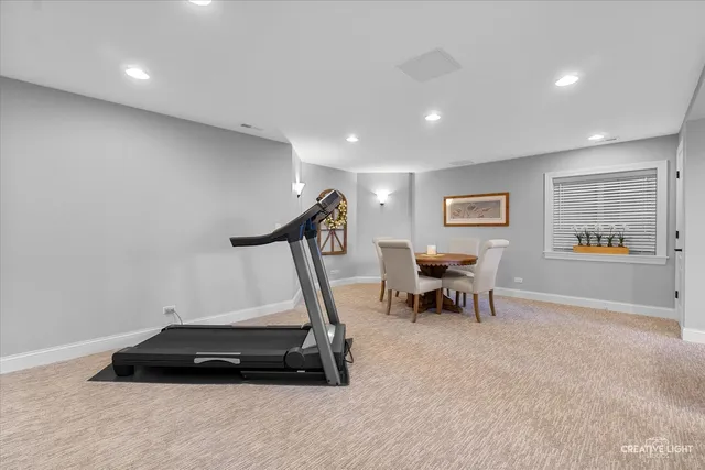 a bathroom with a toilet sink and shower